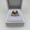 PRE-LOVED 9CT RUBY AND OPAL CLUSTER RING